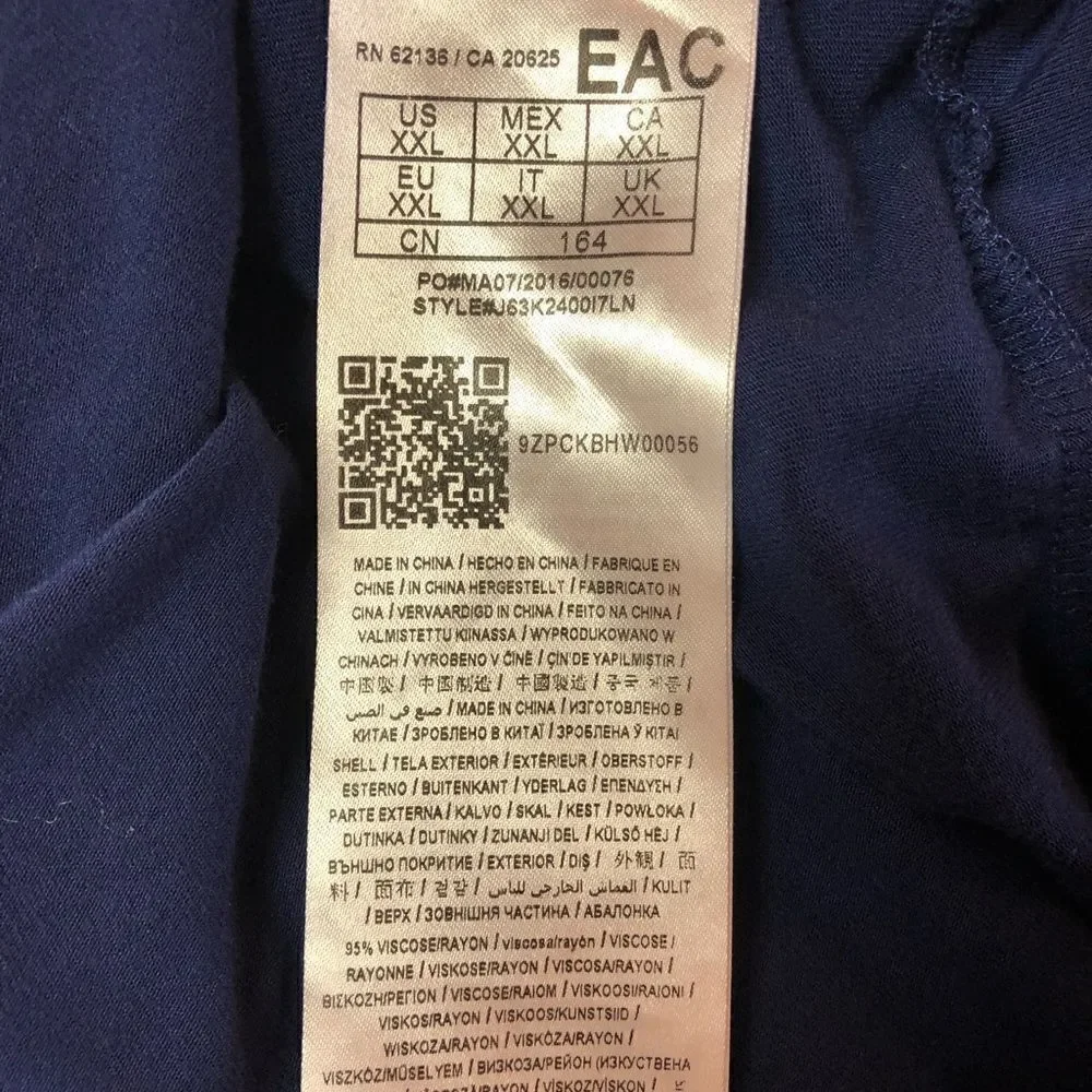 Guess tunic top, small snag line at the top